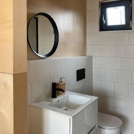 Domy W Ogrodzie - Riverfront Cabins Poznań